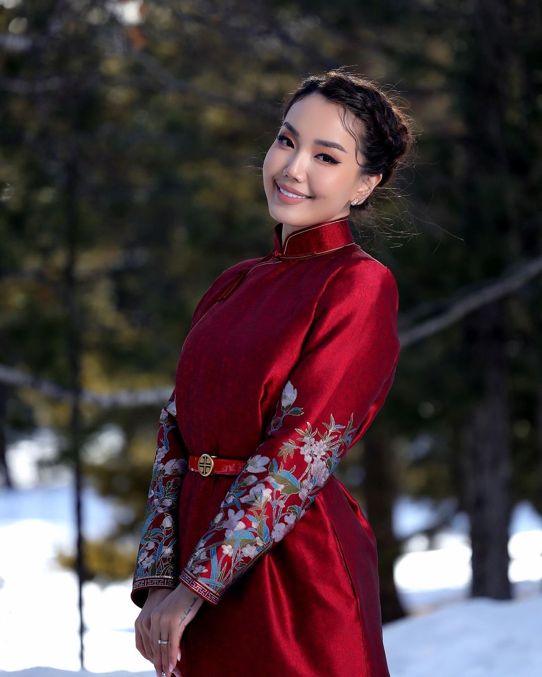 Mongolian women wear red deel clothes