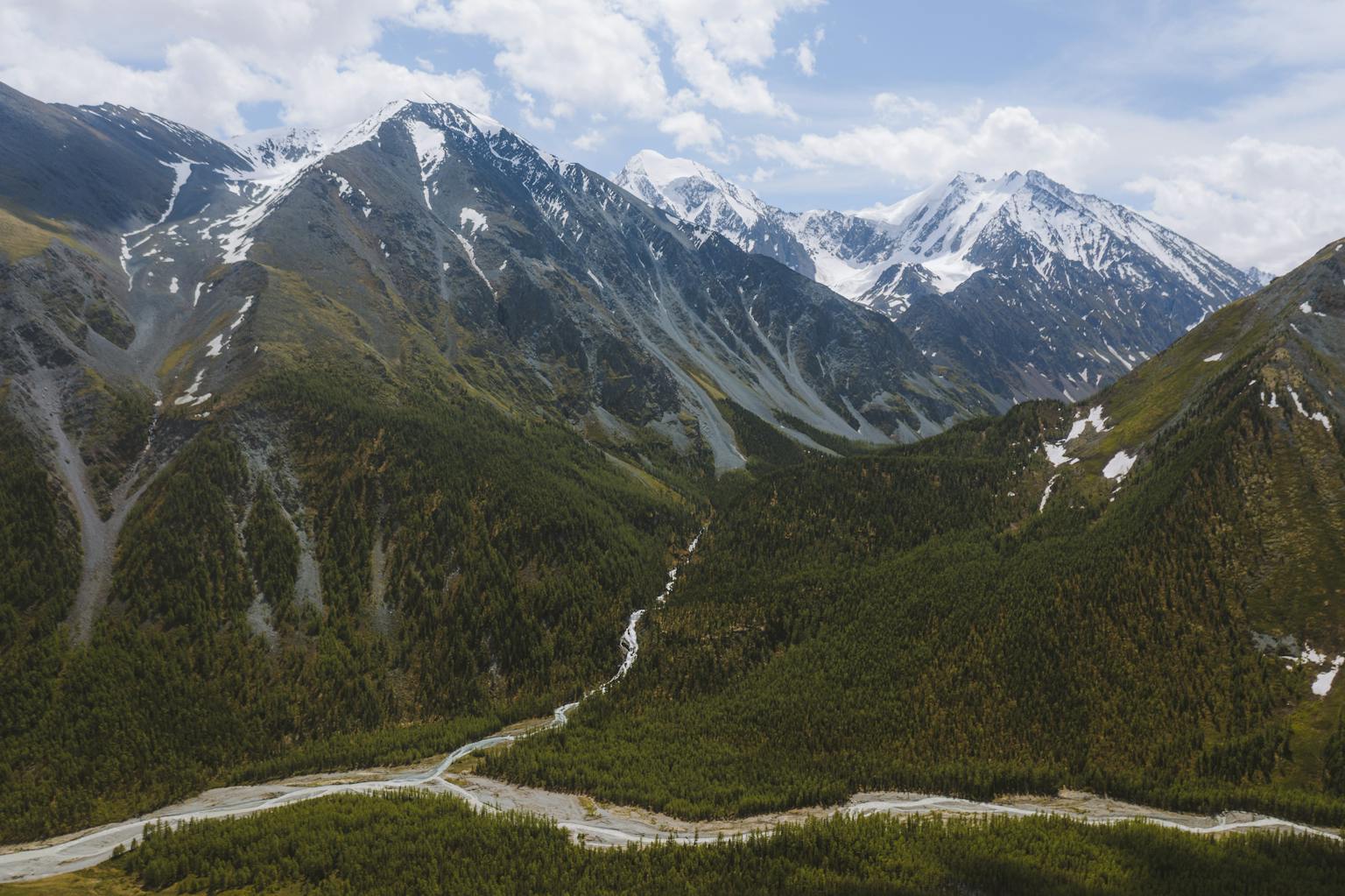 Altai Mountains under Cloudy Blue Sky