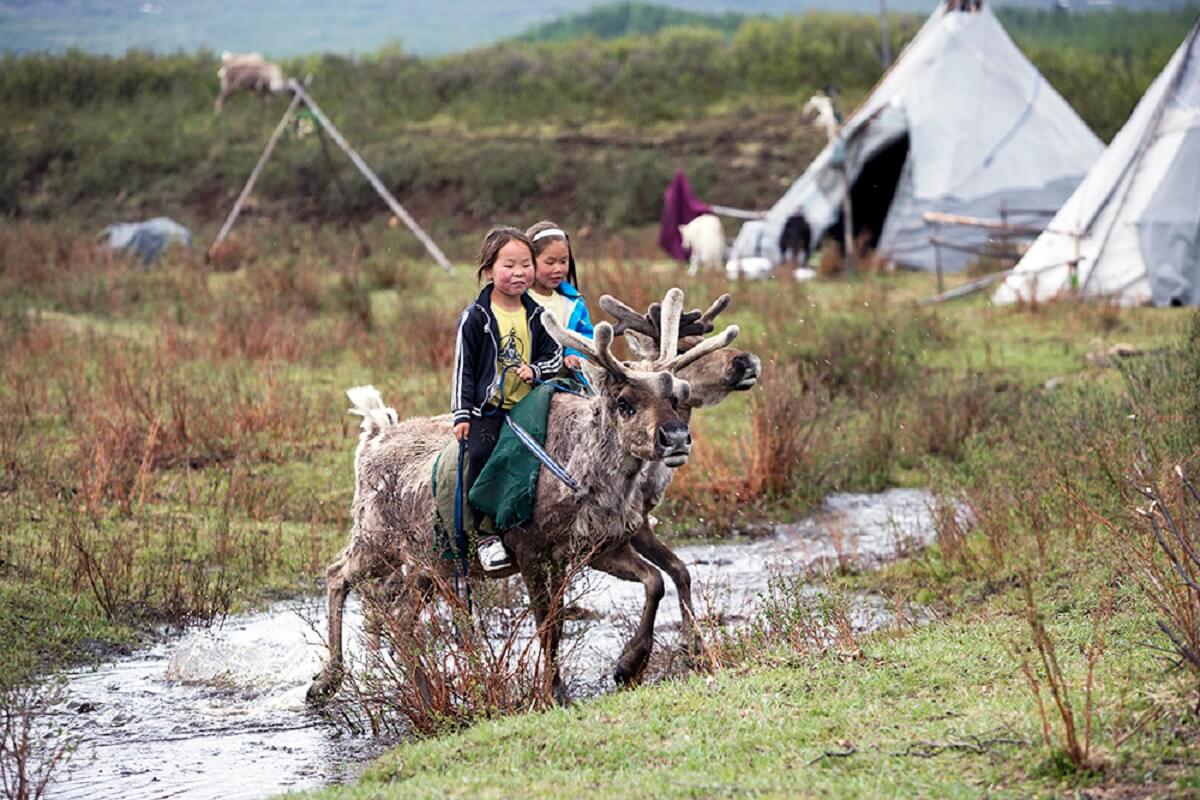 Kids with reindeer