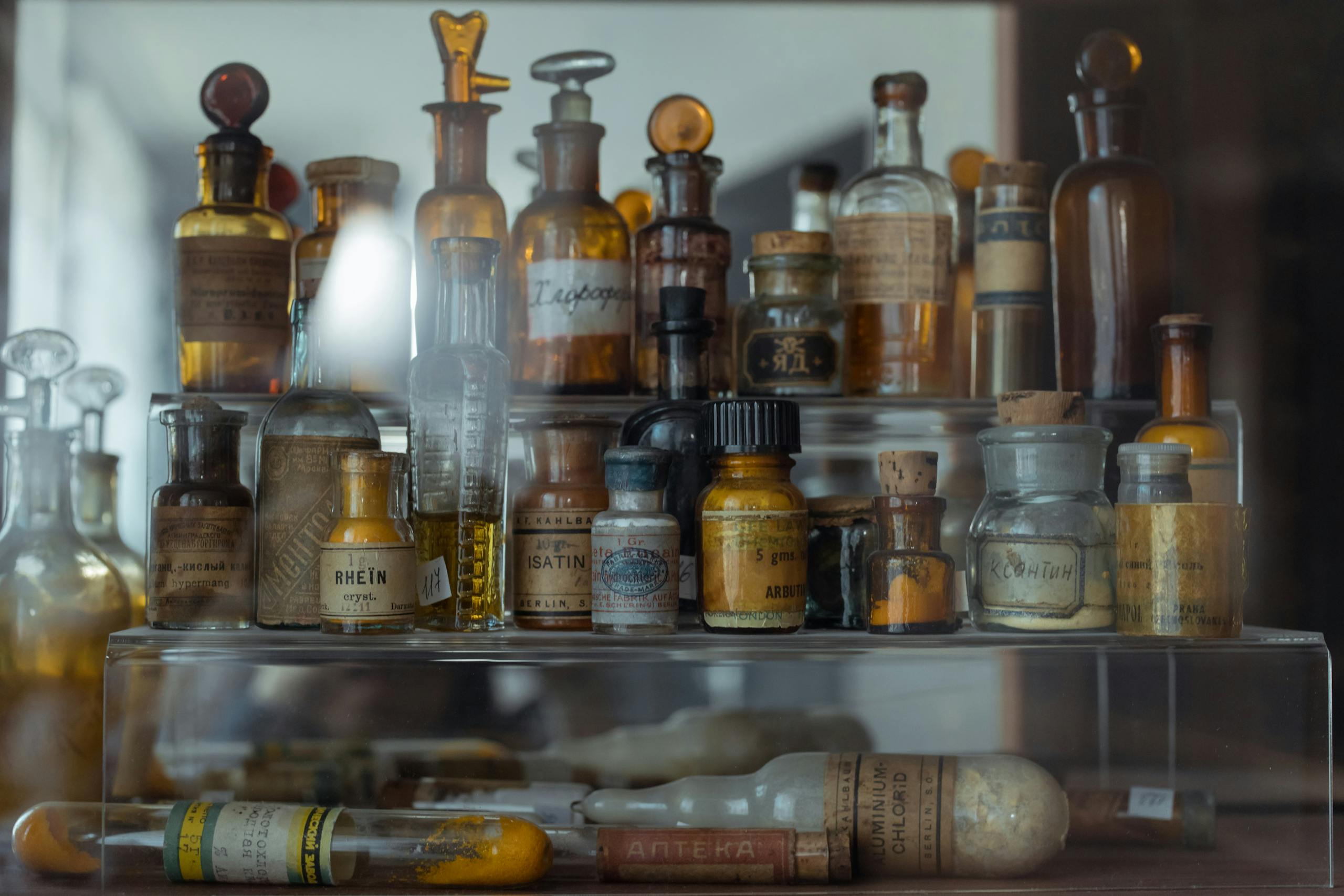 Mongolian Traditional Medicine 30 Collection of vintage apothecary bottles showcasing historical pharmaceutical storage.